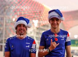 (L to R): Fernando Alonso (ESP) Alpine F1 Team with Esteban Ocon (FRA) Alpine F1 Team. 09.12.2021. Formula 1 World Championship, Rd 22, Abu Dhabi Grand Prix, Yas Marina Circuit, Abu Dhabi, Preparation Day.