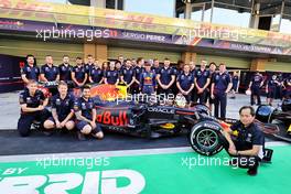 Sergio Perez (MEX) Red Bull Racing RB16B at a team photograph. 09.12.2021. Formula 1 World Championship, Rd 22, Abu Dhabi Grand Prix, Yas Marina Circuit, Abu Dhabi, Preparation Day.