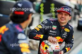 Max Verstappen (NLD) Red Bull Racing at a team photograph. 09.12.2021. Formula 1 World Championship, Rd 22, Abu Dhabi Grand Prix, Yas Marina Circuit, Abu Dhabi, Preparation Day.
