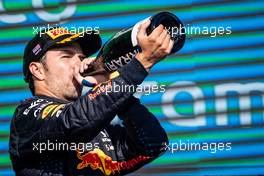 Sergio Perez (MEX) Red Bull Racing celebrates his third position on the podium. 24.10.2021. Formula 1 World Championship, Rd 17, United States Grand Prix, Austin, Texas, USA, Race Day.