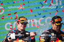 Race winner Max Verstappen (NLD) Red Bull Racing celebrates on the podium with third placed team mate Sergio Perez (MEX) Red Bull Racing. 24.10.2021. Formula 1 World Championship, Rd 17, United States Grand Prix, Austin, Texas, USA, Race Day.