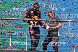 (L to R): Race winner Max Verstappen (NLD) Red Bull Racing celebrates on the podium with Masashi Yamamoto (JPN) Honda Racing F1 Managing Director. 24.10.2021. Formula 1 World Championship, Rd 17, United States Grand Prix, Austin, Texas, USA, Race Day.
