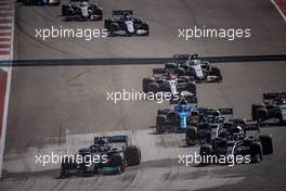 (L to R): Valtteri Bottas (FIN) Mercedes AMG F1 W12 and Yuki Tsunoda (JPN) AlphaTauri AT02 at the start of the race. 24.10.2021. Formula 1 World Championship, Rd 17, United States Grand Prix, Austin, Texas, USA, Race Day.