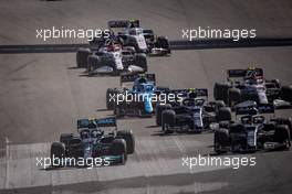 (L to R): Valtteri Bottas (FIN) Mercedes AMG F1 W12 and Yuki Tsunoda (JPN) AlphaTauri AT02 at the start of the race. 24.10.2021. Formula 1 World Championship, Rd 17, United States Grand Prix, Austin, Texas, USA, Race Day.