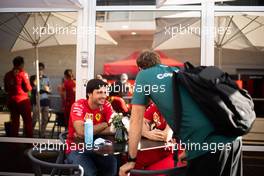 Carlos Sainz Jr (ESP) Ferrari with Sebastian Vettel (GER) Aston Martin F1 Team. 21.10.2021. Formula 1 World Championship, Rd 17, United States Grand Prix, Austin, Texas, USA, Preparation Day.