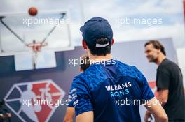 Nicholas Latifi (CDN) Williams Racing and George Russell (GBR) Williams Racing FW43B play basketball in the paddock. 21.10.2021. Formula 1 World Championship, Rd 17, United States Grand Prix, Austin, Texas, USA, Preparation Day.
