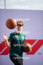 Sebastian Vettel (GER) Aston Martin F1 Team plays basketball in the paddock. 21.10.2021. Formula 1 World Championship, Rd 17, United States Grand Prix, Austin, Texas, USA, Preparation Day.