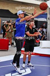 Esteban Ocon (FRA) Alpine F1 Team and Fernando Alonso (ESP) Alpine F1 Team play basketball in the paddock. 21.10.2021. Formula 1 World Championship, Rd 17, United States Grand Prix, Austin, Texas, USA, Preparation Day.