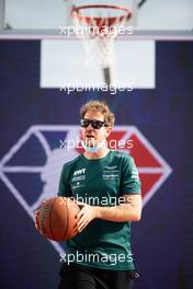 Sebastian Vettel (GER) Aston Martin F1 Team plays basketball in the paddock. 21.10.2021. Formula 1 World Championship, Rd 17, United States Grand Prix, Austin, Texas, USA, Preparation Day.