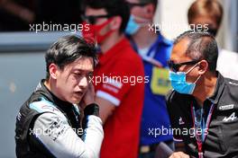 (L to R): Guanyu Zhou (CHN) Uni-Virtuosi Racing celebrates his third position in parc ferme with Mia Sharizman (MAL) Alpine Sport Academy Director. 05.06.2021. FIA Formula 2 Championship, Rd 3, Sprint Race 1, Baku, Azerbaijan, Saturday.