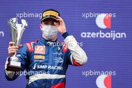 Robert Shwartzman (RUS) PREMA Racing celebrates his third position on the podium. 06.06.2021. FIA Formula 2 Championship, Rd 3, Feature Race, Baku, Azerbaijan, Sunday.