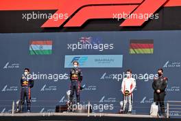 The podium (L to R): Jehan Daruvala (IND) Carlin, second; Liam Lawson (NZL) Hitech, race winner; David Beckmann (GER) Charouz Racing System, third. 27.03.2021. FIA Formula 2 Championship, Rd 1, Sprint Race 1, Sakhir, Bahrain, Saturday.