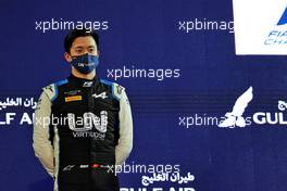 Second placed Guanyu Zhou (CHN) Uni-Virtuosi Racing on the podium. 27.03.2021. FIA Formula 2 Championship, Rd 1, Sprint Race 2, Sakhir, Bahrain, Saturday.