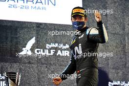 Guanyu Zhou (CHN) Uni-Virtuosi Racing celebrates his second position on the podium. 27.03.2021. FIA Formula 2 Championship, Rd 1, Sprint Race 2, Sakhir, Bahrain, Saturday.