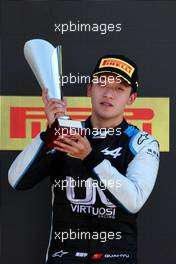 Race winner Guanyu Zhou (CHN) Uni-Virtuosi Racing celebrates on the podium. 18.07.2021. FIA Formula 2 Championship, Rd 4, Feature Race, Silverstone, England, Sunday.