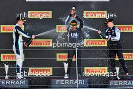 The podium (L to R): Dan Ticktum (GBR) Carlin, second; Guanyu Zhou (CHN) Uni-Virtuosi Racing, race winner; Oscar Piastri (AUS) PREMA Racing, third. 18.07.2021. FIA Formula 2 Championship, Rd 4, Feature Race, Silverstone, England, Sunday.