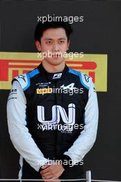 Race winner Guanyu Zhou (CHN) Uni-Virtuosi Racing on the podium. 18.07.2021. FIA Formula 2 Championship, Rd 4, Feature Race, Silverstone, England, Sunday.