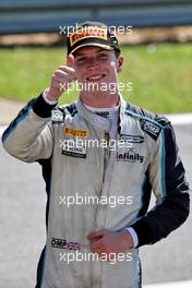 Dan Ticktum (GBR) Carlin celebrates his second position in parc ferme. 18.07.2021. FIA Formula 2 Championship, Rd 4, Feature Race, Silverstone, England, Sunday.