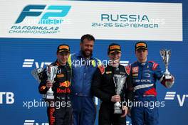 The podium (L to R): Juri Vips (EST) Hitech, second; Dan Ticktum (GBR) Carlin, race winner; Robert Shwartzman (RUS) PREMA Racing, third. 25.09.2021. FIA Formula 2 Championship, Rd 6, Sprint Race 1, Sochi, Russia, Saturday.