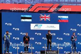The podium (L to R): Juri Vips (EST) Hitech, second; Dan Ticktum (GBR) Carlin, race winner; Robert Shwartzman (RUS) PREMA Racing, third. 25.09.2021. FIA Formula 2 Championship, Rd 6, Sprint Race 1, Sochi, Russia, Saturday.