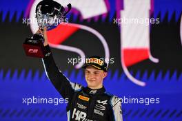 Race winner Oscar Piastri (AUS) PREMA Racing celebrates on the podium. 04.12.2021. FIA Formula 2 Championship, Rd 7, Sprint Race 2, Jeddah, Saudi Arabia, Saturday.