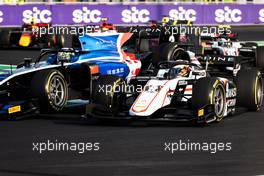 (L to R): Guanyu Zhou (CHN) Uni-Virtuosi Racing collides with Christian Lundgaard (DEN) ART. 04.12.2021. FIA Formula 2 Championship, Rd 7, Sprint Race 1, Jeddah, Saudi Arabia, Saturday.