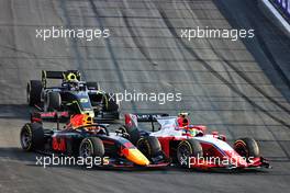 Jehan Daruvala (IND) Carlin and Oscar Piastri (AUS) PREMA Racing battle for position. 04.12.2021. FIA Formula 2 Championship, Rd 7, Sprint Race 1, Jeddah, Saudi Arabia, Saturday.