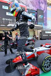 Oscar Piastri (AUS) PREMA Racing celebrates third position and the F2 Championship in parc ferme. 11.12.2021. Formula 2 Championship, Rd 8, Yas Marina Circuit, Abu Dhabi, UAE, Sprint Race 1, Saturday.