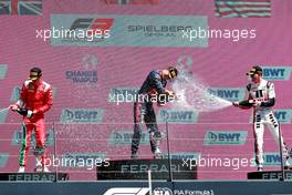 The podium (L to R): Olli Caldwell (GBR) PREMA Racing, second; Dennis Hauger (DEN) PREMA Racing, race winner; Logan Sargeant (USA) Charouz Racing System, third. 03.07.2021. FIA Formula 3 Championship, Rd 3, Race 1, Spielberg, Austria, Saturday.