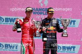 (L to R): second placed Olli Caldwell (GBR) PREMA Racing celebrates with race winner Dennis Hauger (DEN) PREMA Racing on the podium. 03.07.2021. FIA Formula 3 Championship, Rd 3, Race 1, Spielberg, Austria, Saturday.