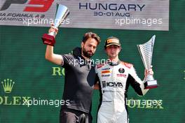 Race winner Lorenzo Colombo (ITA) Campos Racing celebrates on the podium. 31.07.2021. FIA Formula 3 Championship, Rd 4, Race 1, Budapest, Hungary, Saturday.