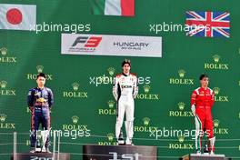 The podium (L to R): Ayumu Iwasa (JPN) Trident, second; Lorenzo Colombo (ITA) Campos Racing, race winner; Olli Caldwell (GBR) PREMA Racing, third.  31.07.2021. FIA Formula 3 Championship, Rd 4, Race 1, Budapest, Hungary, Saturday.