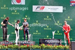 The podium (L to R): Lorenzo Colombo (ITA) Campos Racing, race winner; Ayumu Iwasa (JPN) Trident, second; Olli Caldwell (GBR) PREMA Racing, third. 31.07.2021. FIA Formula 3 Championship, Rd 4, Race 1, Budapest, Hungary, Saturday.