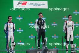 The podium (L to R): Clement Novalak (GBR) Carlin, second; Victor Martins (FRA) MP Motorsport, race winner; Frederik Vesti (DEN) ART, third. 04.09.2021. Formula 3 Championship, Rd 6, Race 2, Zandvoort, Netherlands, Saturday.