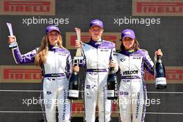 The podium (L to R): Fabienne Wohlwend (LIE) Bunker Racing, second; Alice Powell (GBR) Racing X, race winner; Jamie Chadwick (GBR) Veloce Racing, third. 17.07.2021. W Series, Rd 3, Silverstone, England, Race Day.