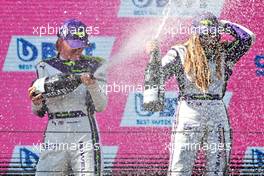 (L to R): Race winner Alice Powell (GBR) celebrates on the podium with second placed Fabienne Wohlwend (LIE). 26.06.2021. W Series, Rd 1, Spielberg, Austria, Race Day.