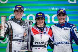 The championship top three on the podium (L to R): Alice Powell (GBR) Racing X, second; Jamie Chadwick (GBR) Veloce Racing, W Series Champion; Emma Kimilainen (FIN) Ecurie W, third. 24.10.2021. W Series, Rd 7, Austin, Texas, USA, Race 2 Day.