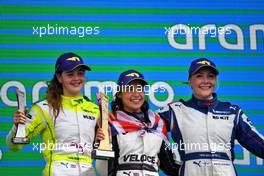 The podium (L to R): Abbi Pulling (GBR) Puma W Series Team, second; Jamie Chadwick (GBR) Williams Racing FW43B Development Driver, race winner; Emma Kimilainen (FIN) Ecurie W, third. 24.10.2021. W Series, Rd 7, Austin, Texas, USA, Race 2 Day.