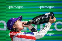 Race winner and W Series Champion Jamie Chadwick (GBR) Veloce Racing celebrates on the podium. 24.10.2021. W Series, Rd 7, Austin, Texas, USA, Race 2 Day.