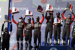 The podium (L to R): Mike Conway (GBR) / Kamui Kobayashi (JPN) / Jose Maria Lopez (ARG) #07 Toyota Gazoo Racing Toyota GR010 Hybrid, second; Brendon Hartley (NZL) / Sebastien Buemi (SUI) / Kazuki Nakajima (JPN) #08 Toyota Racing, Toyota GR010, Hybrid, race winners. 13.06.2021. FIA World Endurance Championship, Rd 2, Portimao, Portugal.