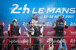 (L to R): Race winners Brendon Hartley (NZL) and Jose Maria Lopez (ARG) #07 Toyota Gazoo Racing celebrate on the podium. 22.08.2021. FIA World Endurance Championship, Le Mans 24 Hour Race, Le Mans, France, Sunday.