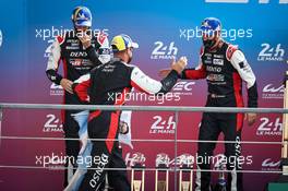 (L to R): Brendon Hartley (NZL) and Sebastien Buemi (SUI), #08 Toyota Racing, celebrate their second position on the podium. 22.08.2021. FIA World Endurance Championship, Le Mans 24 Hour Race, Le Mans, France, Sunday.