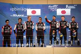 The podium (L to R): Kazuki Nakajima (JPN), Brendon Hartley (NZL), and Sebastien Buemi (SUI) #08 Toyota Racing, second; Jose Maria Lopez (ARG), Mike Conway (GBR), and Kamui Kobayashi (JPN) #07 Toyota Gazoo Racing, race winners. 30.10.2021. FIA World Endurance Championship, Round 5, Six Hours of Bahrain, Sakhir, Bahrain, Saturday.