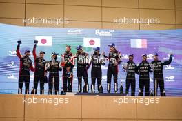 The podium (L to R): Jose Maria Lopez (ARG), Mike Conway (GBR), Kamui Kobayashi (JPN) #07 Toyota Gazoo Racing, second; Sebastien Buemi (SUI), Kazuki Nakajima (JPN), Brendon Hartley (NZL) #08 Toyota Racing, race winners; Andre Negrao (BRA), Nicolas Lapierre (FRA), Mathieu Vaxiviere #36 Alpine Elf Matmut, third. 06.11.2021. FIA World Endurance Championship, Round 6, Eight Hours of Bahrain, Sakhir, Bahrain, Saturday.