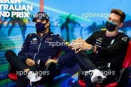 (L to R): Sergio Perez (MEX) Red Bull Racing and George Russell (GBR) Mercedes AMG F1 in the FIA Press Conference. 08.04.2022. Formula 1 World Championship, Rd 3, Australian Grand Prix, Albert Park, Melbourne, Australia, Practice Day.