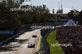 Lewis Hamilton (GBR) Mercedes AMG F1 W13 leads Sergio Perez (MEX) Red Bull Racing RB18. 10.04.2022. Formula 1 World Championship, Rd 3, Australian Grand Prix, Albert Park, Melbourne, Australia, Race Day.