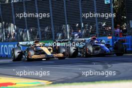 Daniel Ricciardo (AUS) McLaren MCL36 and Alexander Albon (THA) Williams Racing FW44 battle for position. 10.04.2022. Formula 1 World Championship, Rd 3, Australian Grand Prix, Albert Park, Melbourne, Australia, Race Day.