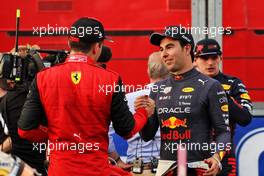 (L to R): Charles Leclerc (MON) Ferrari celebrates his pole position in qualifying parc ferme with third placed Sergio Perez (MEX) Red Bull Racing. 09.04.2022. Formula 1 World Championship, Rd 3, Australian Grand Prix, Albert Park, Melbourne, Australia, Qualifying Day.
