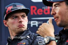 Max Verstappen (NLD) Red Bull Racing with Sergio Perez (MEX) Red Bull Racing. 07.04.2022. Formula 1 World Championship, Rd 3, Australian Grand Prix, Albert Park, Melbourne, Australia, Preparation Day.