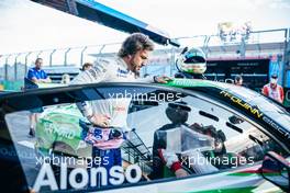 Fernando Alonso (ESP) Alpine F1 Team with Thomas Randle (AUS) in a Tickford Mustang Aussie V8 Supercar. 07.04.2022. Formula 1 World Championship, Rd 3, Australian Grand Prix, Albert Park, Melbourne, Australia, Preparation Day.